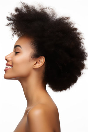 Beautiful african american young woman with afro hairstyleの素材