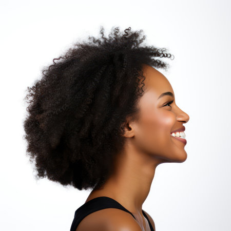 Beautiful african american woman with Afro hairstyle on white backgroundの素材