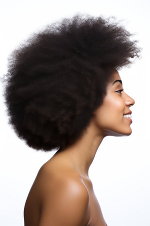 Beautiful african american woman with afro hairstyle on white backgroundの素材