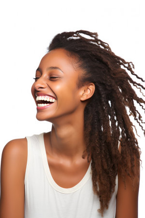 Beautiful young african american woman laughing, isolated on white backgroundの素材