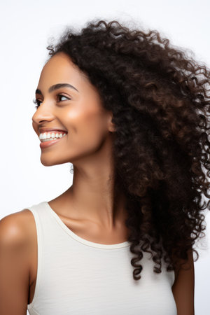 Portrait of beautiful african american young woman with curly hairの素材