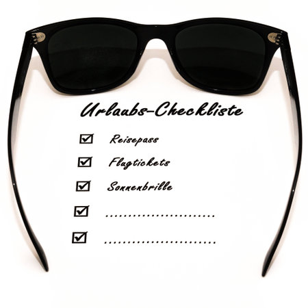 holiday checklist with sunglassesの写真素材