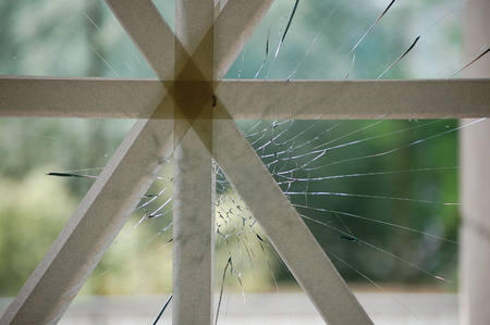 glass broken by vandalsの写真素材