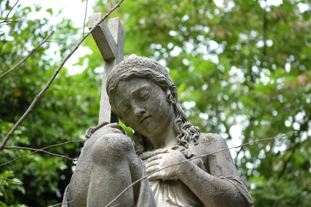 statue of a kneeling womanの写真素材