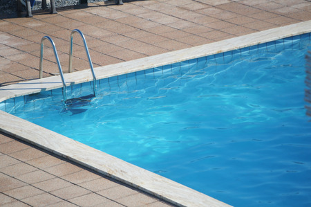 ladder of a swimming poolの写真素材