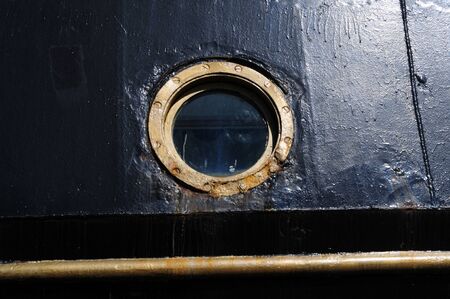 porthole of a vintage sailing ship