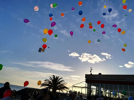 colorful balloons in flight during a partyの写真素材