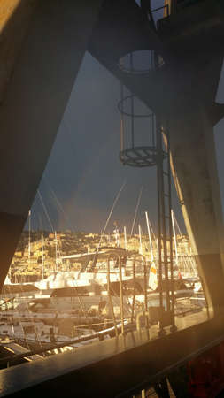 rainbow over the Old Port of Genoa In Italyの写真素材