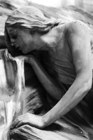 statue of young woman drinking at a stream at the monumental cemetery of Staglieno in Genoa Italy