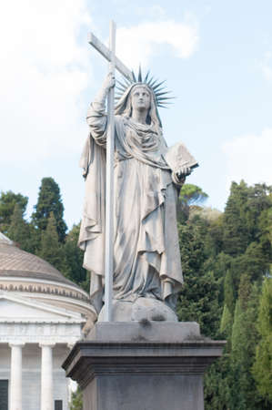 statue of the Madonna at the monumental cemetery of Staglieno in Genoa Italyの写真素材