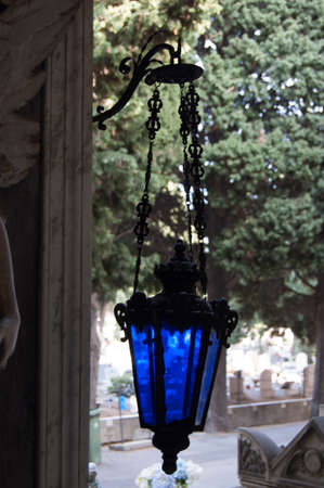 ancient funeral lamp with blue glassesの写真素材