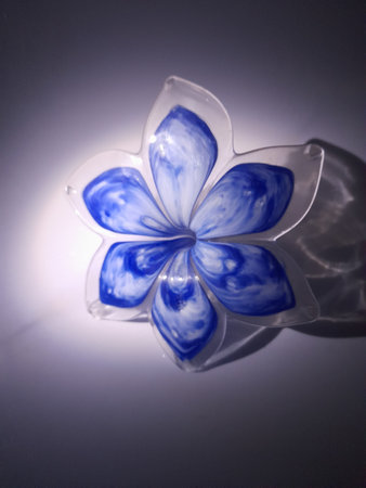 blue flower in Murano glassの写真素材
