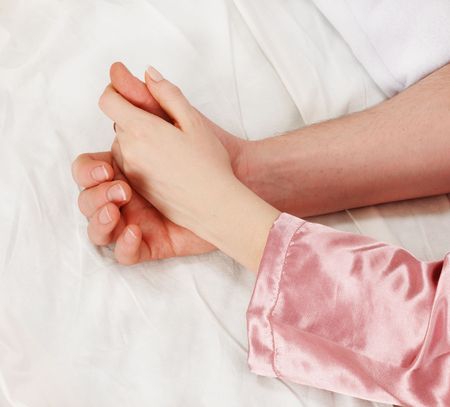 man and woman handsの写真素材