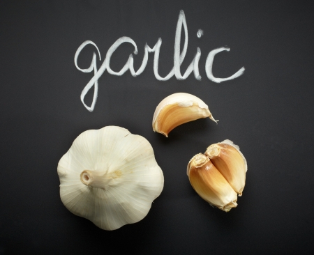 garlic on black backgroundの写真素材