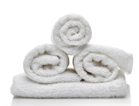 white spa towels on a white backgroundの写真素材
