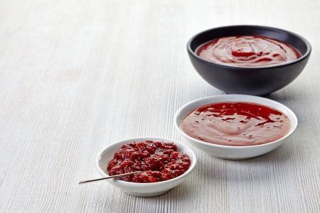 various sauces on white wooden tableの写真素材