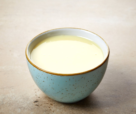 bowl of homemade vanilla sauceの写真素材
