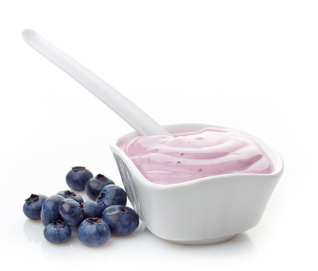 bowl of pink yogurt on a white backgroundの写真素材