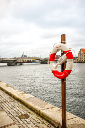 Copenhagen, Denmark - MARCH 29, 2017: Life belt on Havnepromenadeのeditorial素材