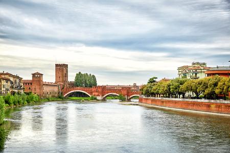 Panoramic view of Bridge Ponte Pietra in Verona on Adige riverの写真素材