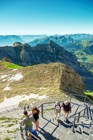 Saentis, Switzerland - JULY 17, 2017: Travelers enjoying Alpine panorama, Swiss Alps landscape, Saentis Mountain - Alpsteinのeditorial素材