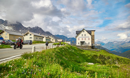 Furka Pass, Switzerland - 17 JULY, 2017: Panoramic view of swiss Alps  and a mountain roadのeditorial素材