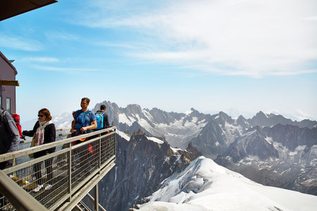 Chamonix Mont-Blanc, France - July 19, 2017: Travelers enjoying Alpine panorama, Famous Tower Aiguille du Midi 3842m. Mont Blanc Massifのeditorial素材