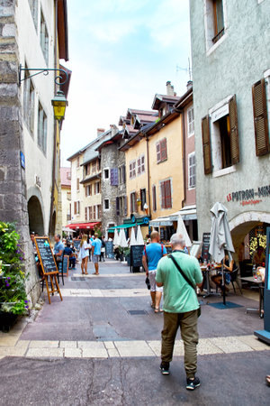Annecy, France - JULY 19, 2017: People walking, and eating around Old Town Annecyのeditorial素材