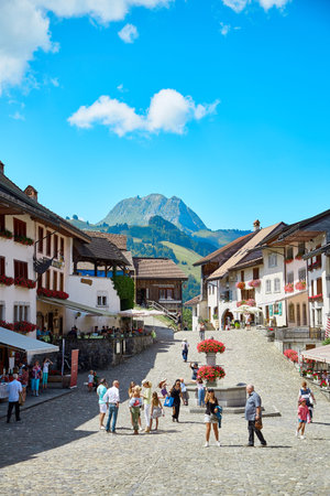 Gruyere, Switzerland - JULY 20, 2017: Street view of Old Town Gruyere, tourists walk around the townのeditorial素材