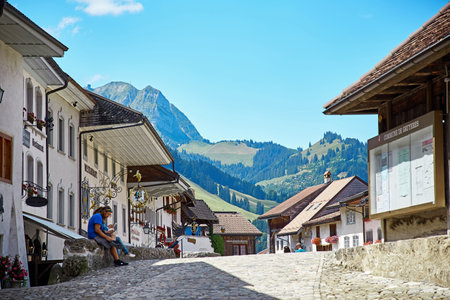 Gruyere, Switzerland - JULY 20, 2017: Street view of Old Town Gruyere, tourists walk around the townのeditorial素材