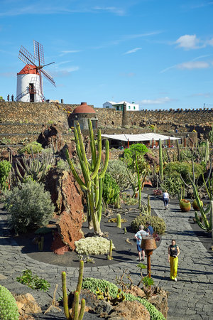 Lanzarote, Spain - DECEMBER 02, 2017: Tourists are walking in  Cactus garden Jardin de Cactus, Canary Islandsのeditorial素材