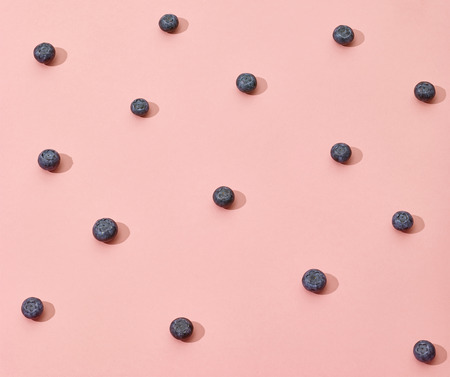 fresh blueberries on pink backgroundの写真素材