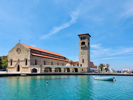 Rodos, Greece - MAY 12, 2019: Mandraki harbor, Evangelismos Church,  Rhodes, Greeceのeditorial素材