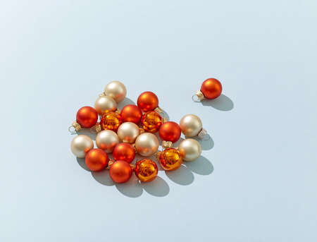 various christmas balls on blue paper backgroundの写真素材