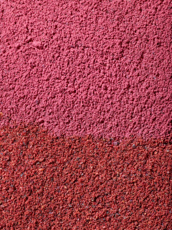 two different red dried plant powder textureの写真素材