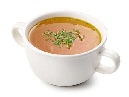 bowl of broth isolated on white backgroundの写真素材