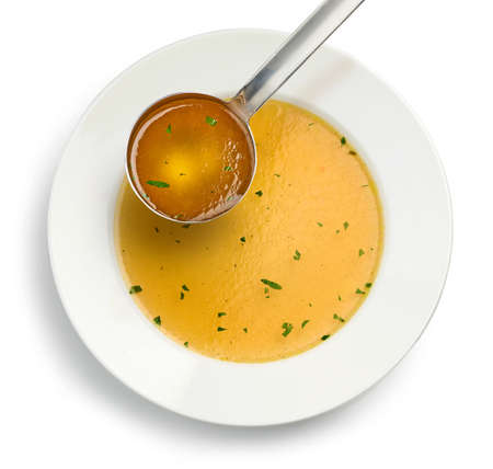 plate of fresh chicken broth on white background, top viewの写真素材