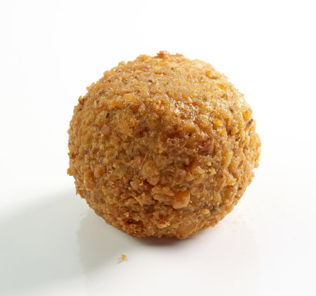 fried falafel ball on white backgroundの写真素材