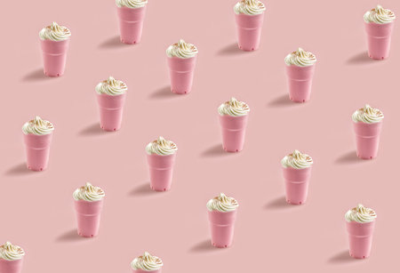pink strawberry milkshake pattern on pink backgroundの写真素材