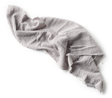 grey crumpled rustic cotton napkin isolated on white background, top viewの写真素材