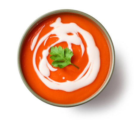 bowl of vegetable cream soup isolated on white background, top viewの写真素材