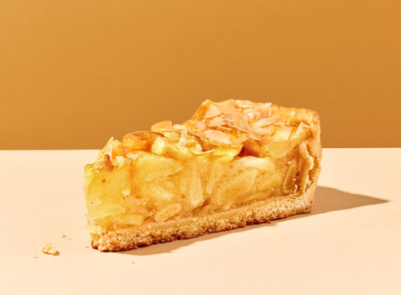 piece of apple cake on colorful backgroundの写真素材