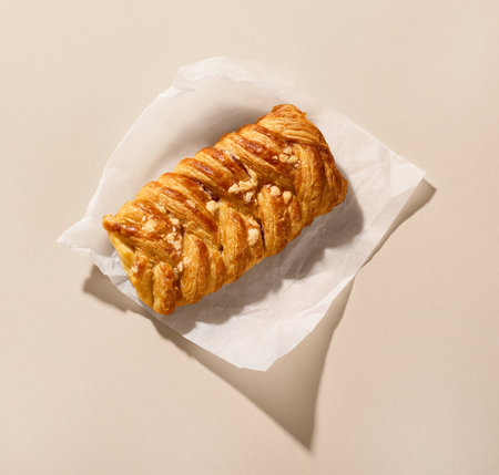freshly baked sweet pastrie on beige background, top viewの写真素材