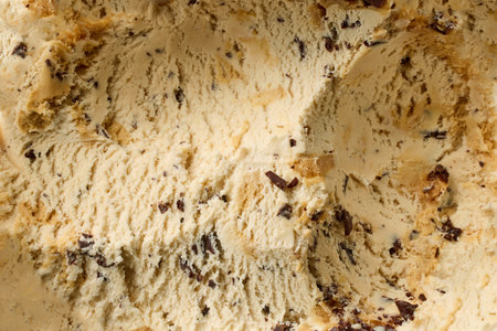 coffee liqueur ice cream with chocolate pieces background, texture, top viewの写真素材