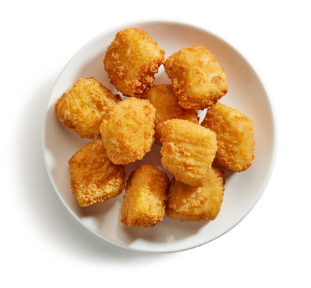 fried fish fillet nuggets isolated on white background, top viewの写真素材