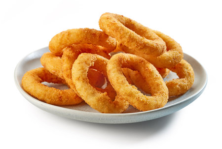 plate of fried onion rings isolated on white backgroundの写真素材