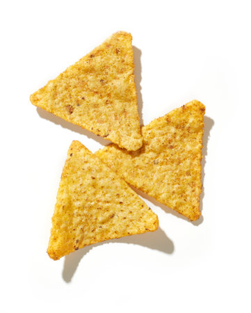 Golden nachos chips isolated on white background., top viewの写真素材