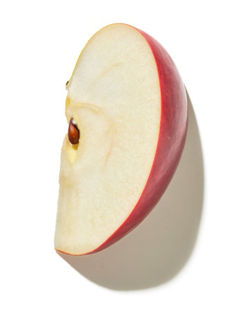 slice of fresh red apple isolated on white background, top viewの写真素材