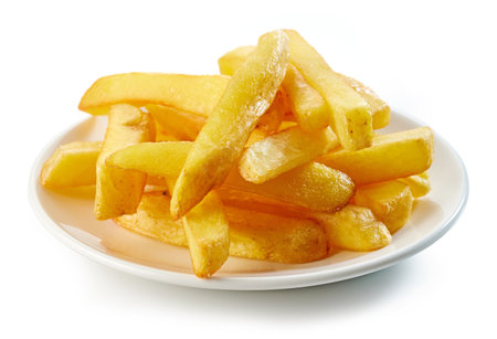 plate of fried potatoes isolated on white backgroundの写真素材