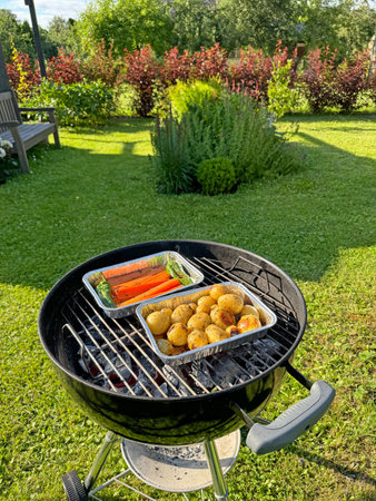 Vegetables are grilled in the gardenの写真素材